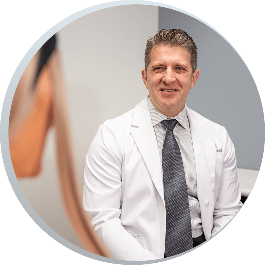 Dr. Justin Tooke smiling