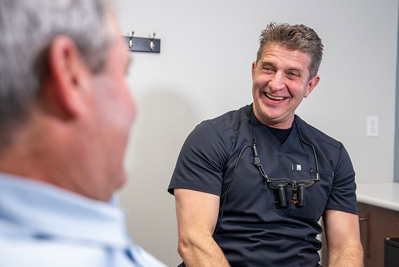 Dr. Justin Tooke smiling