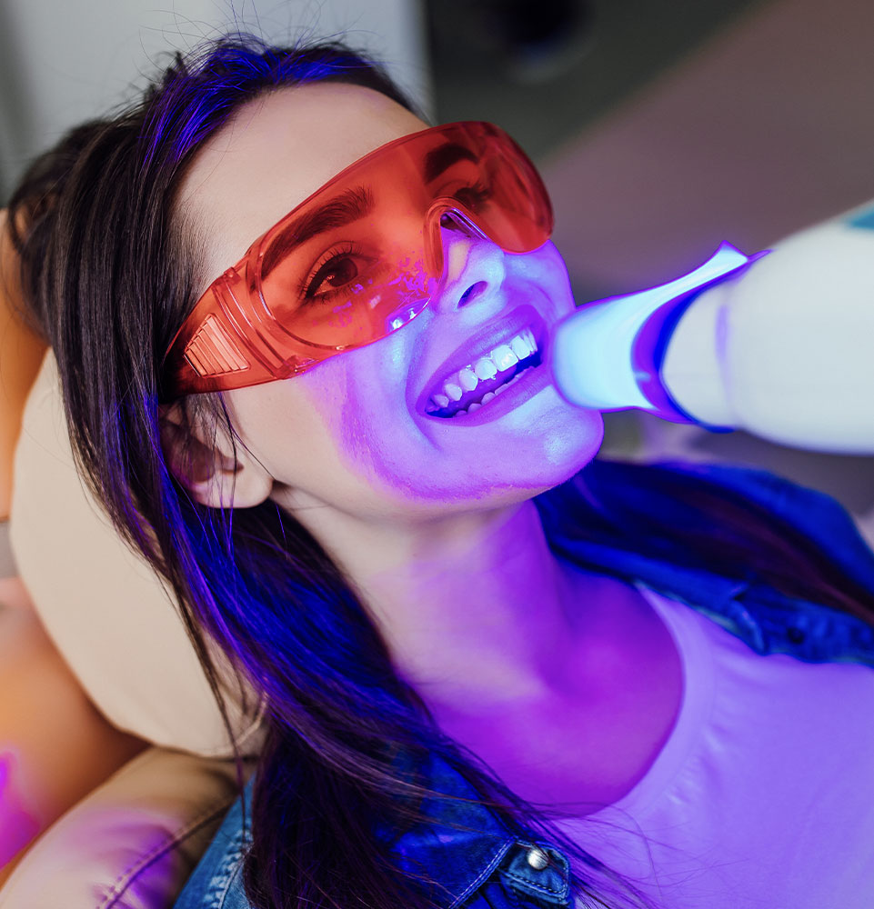 dental patient receiving teeth whitening treatment